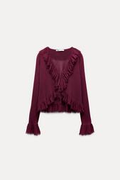 RUFFLED KNIT BLOUSE