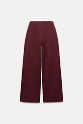 INTERLOCK KNIT TROUSERS WITH VENTS