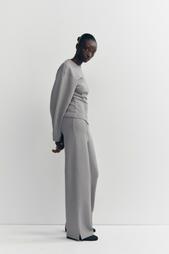 INTERLOCK KNIT TROUSERS WITH VENTS