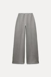 INTERLOCK KNIT TROUSERS WITH VENTS