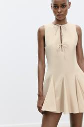 SHORT DRESS WITH BOWS AND GODET HEM